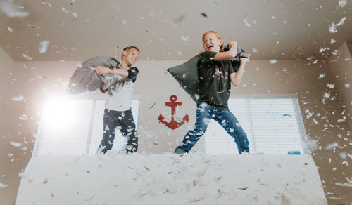 strategies to communicate with your child with ADHD children having a pillow fight